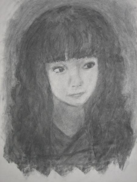 A2 lifesize charcoal drawing of my friend in class. She's a really cute china-tan.